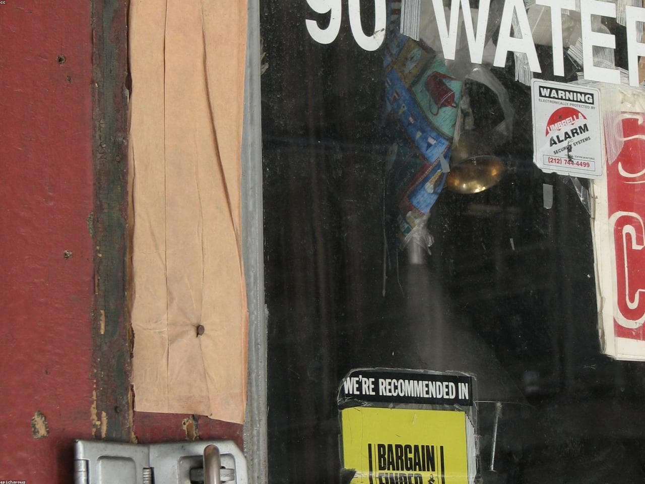 Storefront door lock and handle close-up.